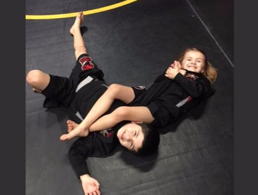 Girl and Boy Arm Hold